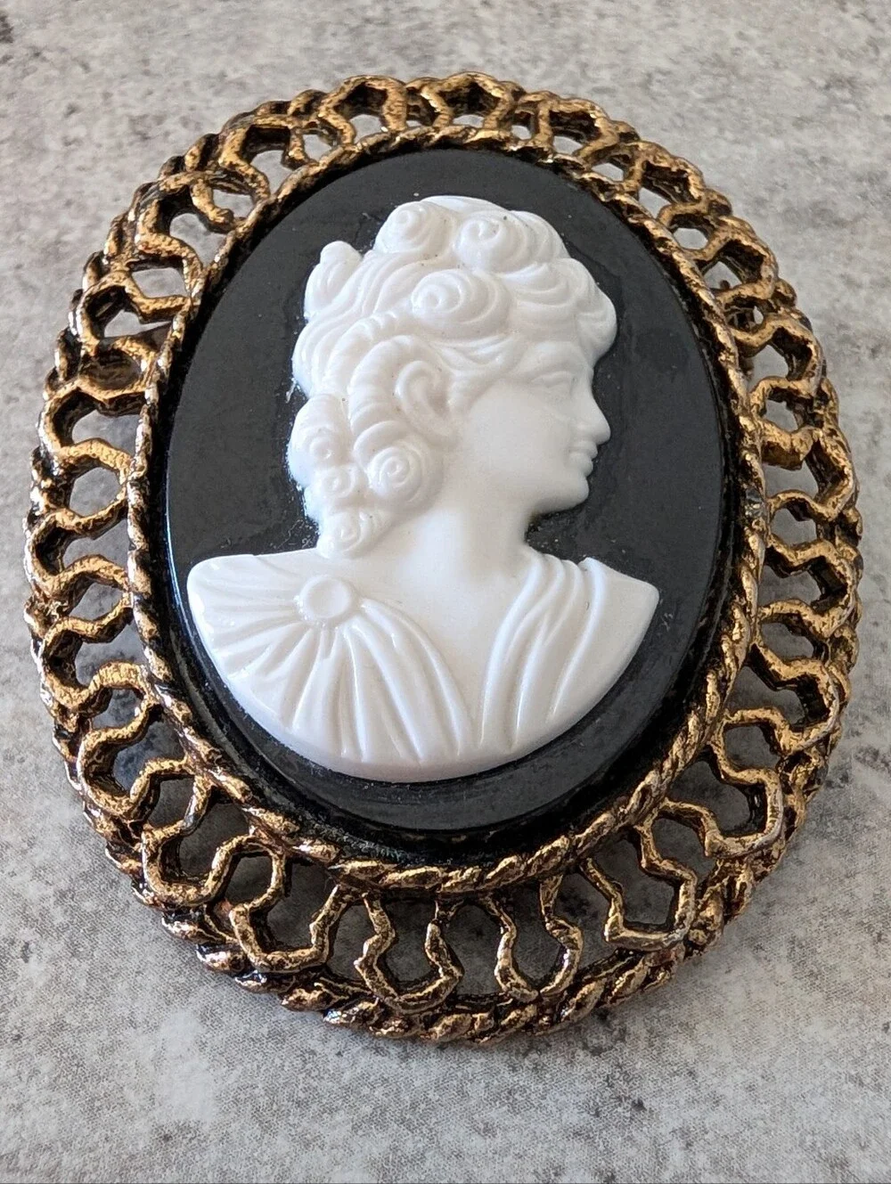 Classic Black and White Cameo Brooch with Gold Frame